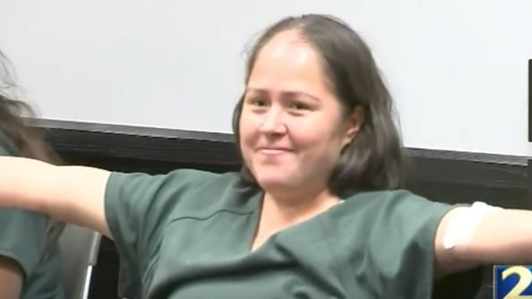 Illegal immigrant accused of slaughtering her family does something bizarre in court